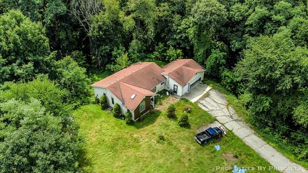 3.33 Acres of Land with Home for Sale in Sparta, Michigan