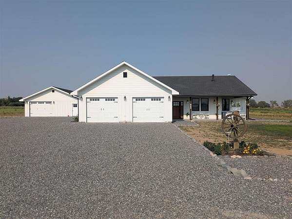 9 Acres of Land with Home for Sale in Powell, Wyoming