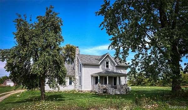 10 Acres of Land with Home for Sale in Burnside Township, Michigan