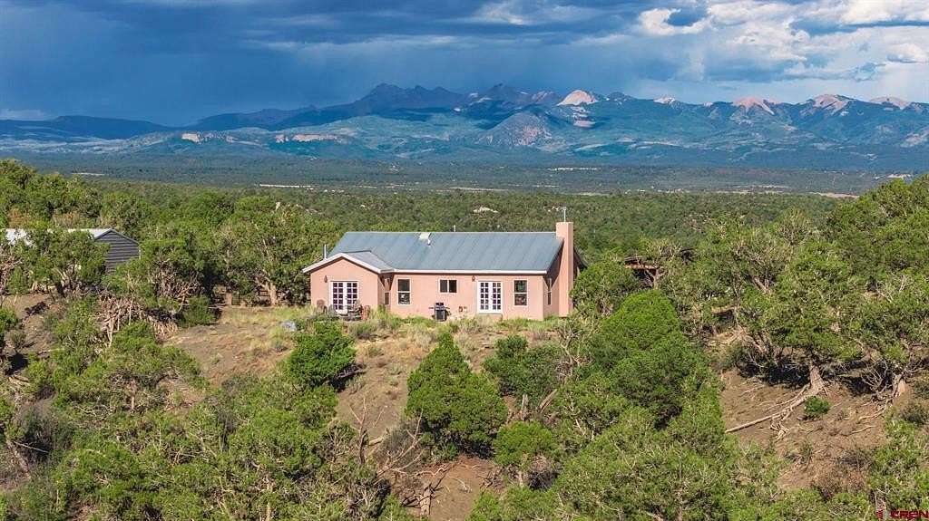 10 Acres of Land with Home for Sale in Mancos, Colorado
