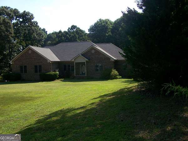 6.5 Acres of Land with Home for Sale in Locust Grove, Georgia