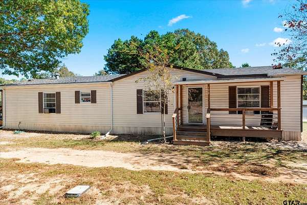 6.75 Acres of Land with Home for Sale in Leesburg, Texas