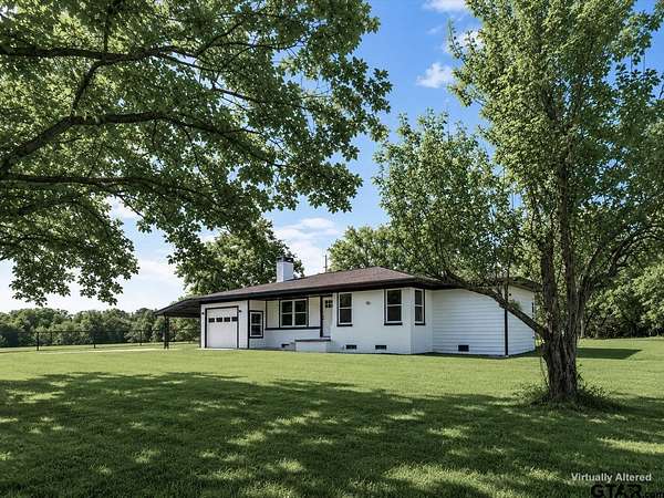 10.3 Acres of Land with Home for Sale in Gilmer, Texas