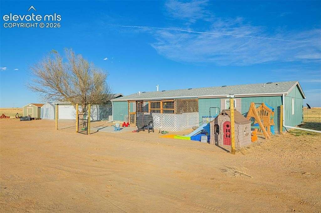27 Acres of Agricultural Land with Home for Sale in Yoder, Colorado