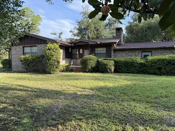 7 Acres of Land with Home for Sale in Perry, Florida