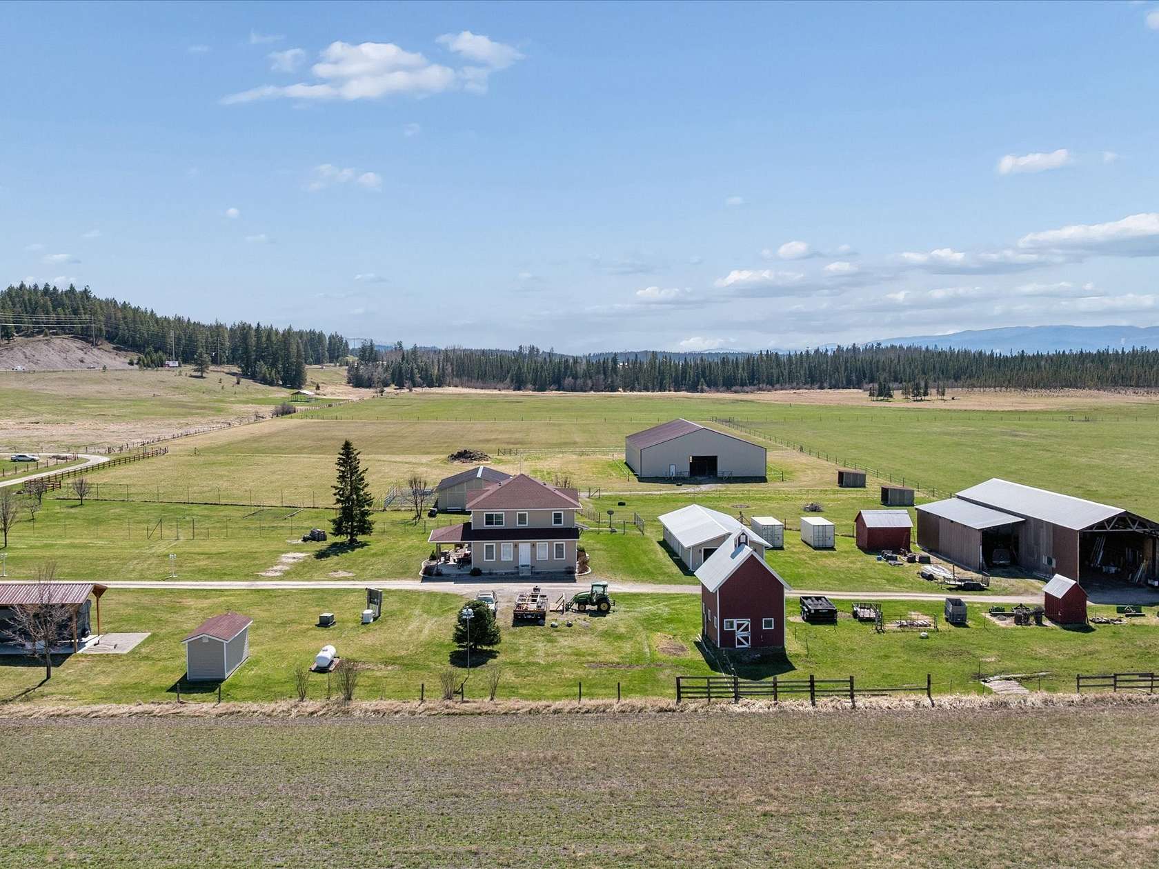 60 Acres of Agricultural Land with Home for Sale in Kalispell, Montana