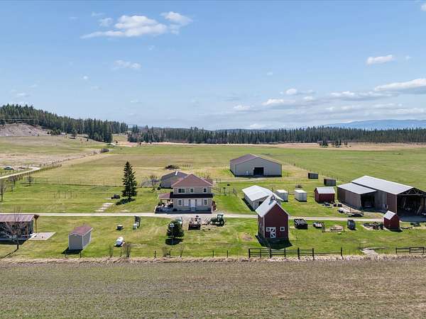 60 Acres of Agricultural Land with Home for Sale in Kalispell, Montana