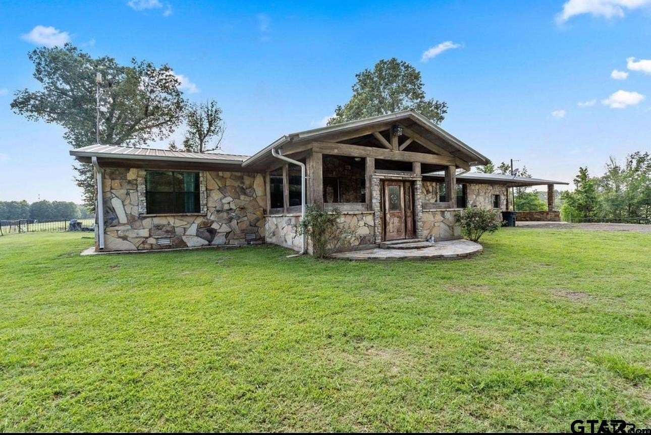 30.8 Acres of Agricultural Land with Home for Sale in Hughes Springs, Texas