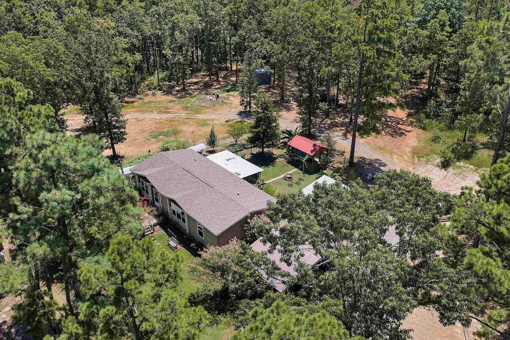 8 Acres of Land with Home for Sale in Gary, Texas