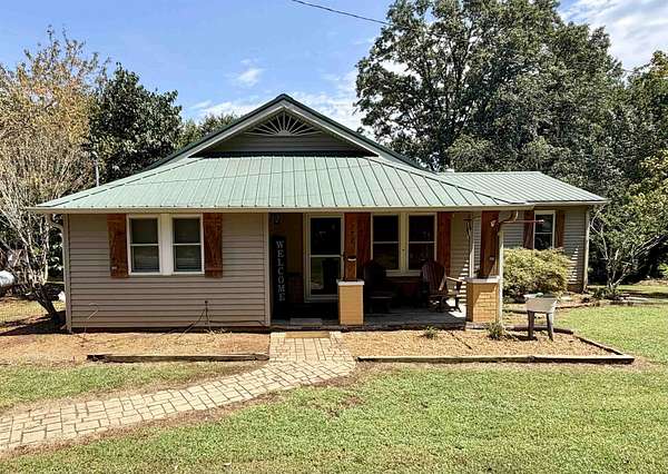 3.2 Acres of Land with Home for Sale in Adamsville, Tennessee