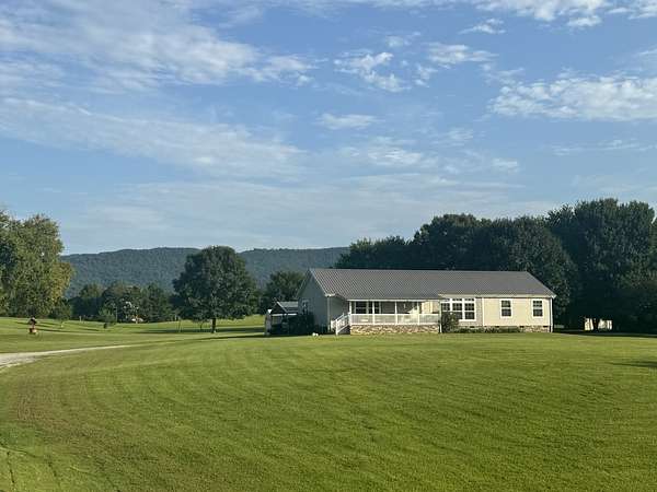3.85 Acres of Land with Home for Sale in Benton, Tennessee