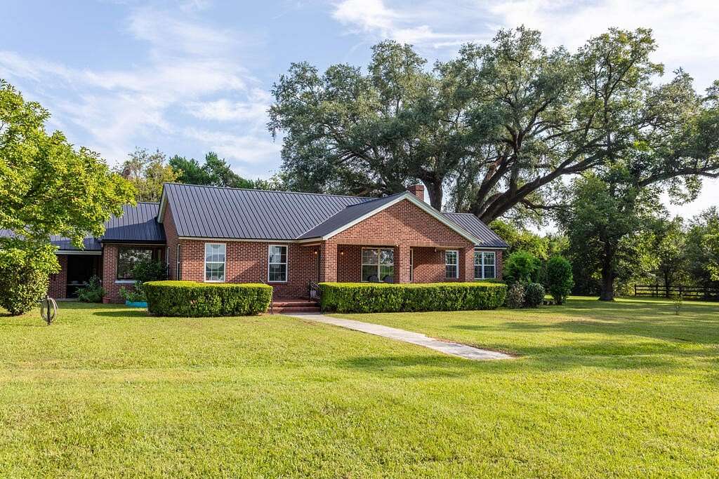 23.5 Acres of Recreational Land with Home for Sale in Camilla, Georgia