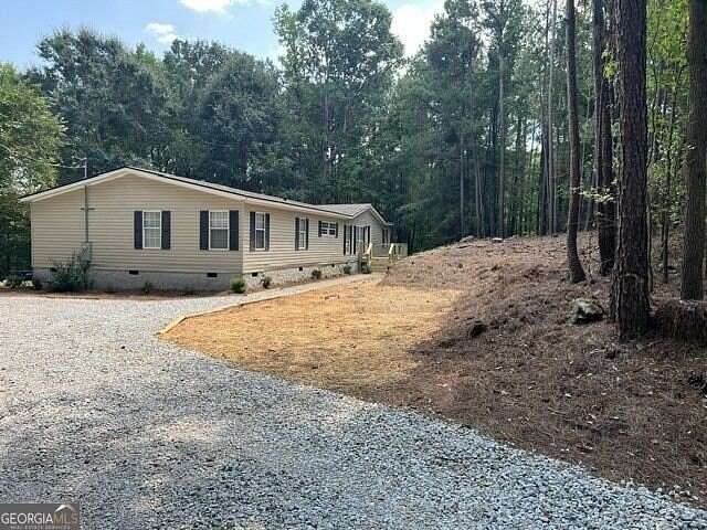 3.49 Acres of Land with Home for Sale in Jackson, Georgia