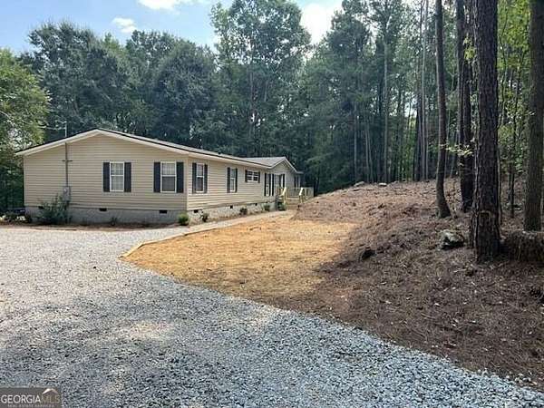 3.49 Acres of Land with Home for Sale in Jackson, Georgia
