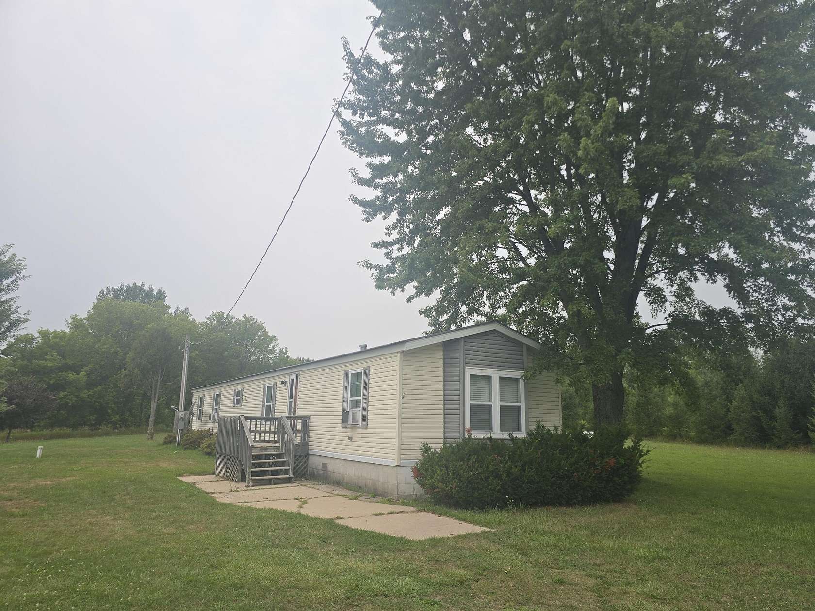 1.72 Acres of Land with Home for Sale in Walkerville, Michigan