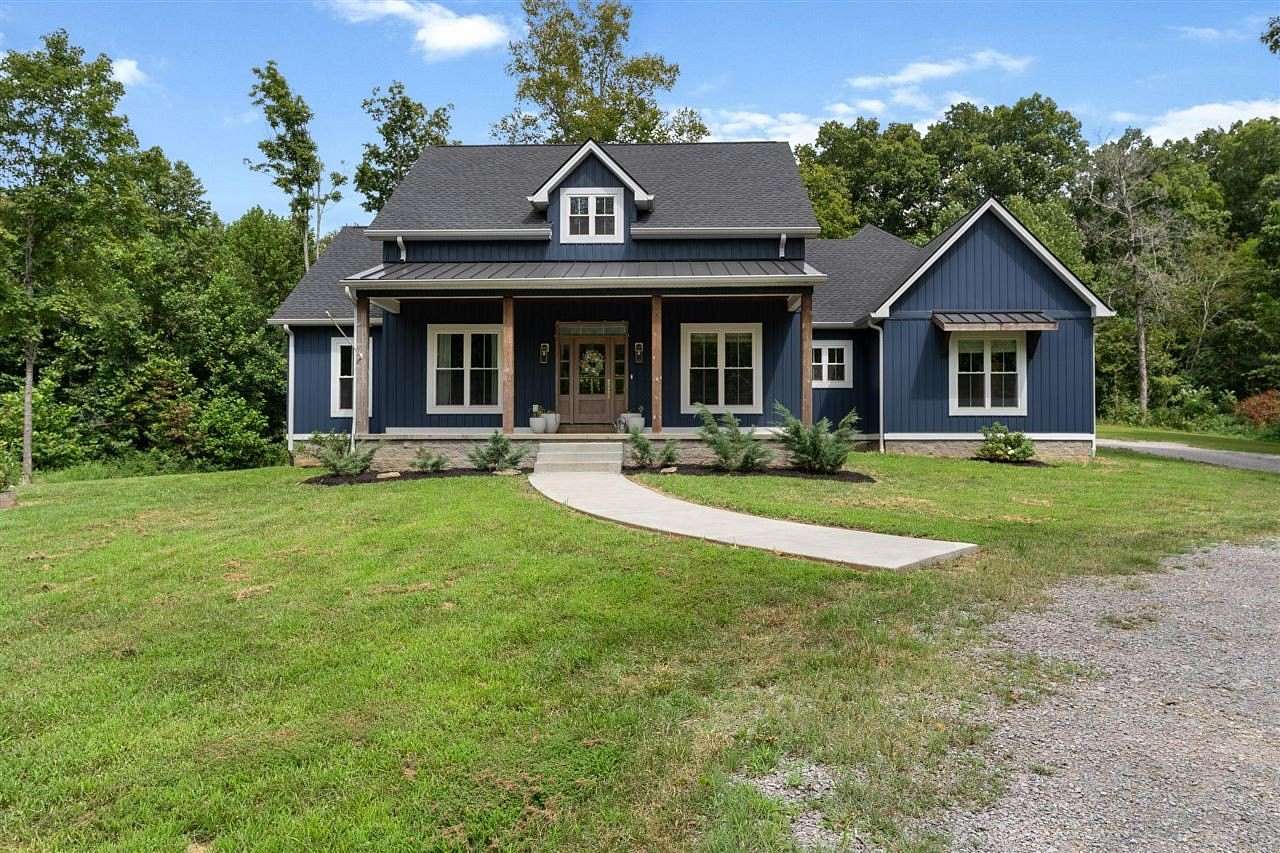 7.36 Acres of Land with Home for Sale in Scottsville, Kentucky