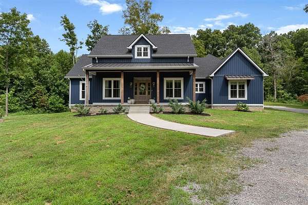7.36 Acres of Land with Home for Sale in Scottsville, Kentucky