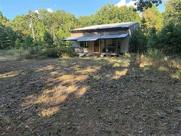 20 Acres of Recreational Land with Home for Sale in Howe, Oklahoma