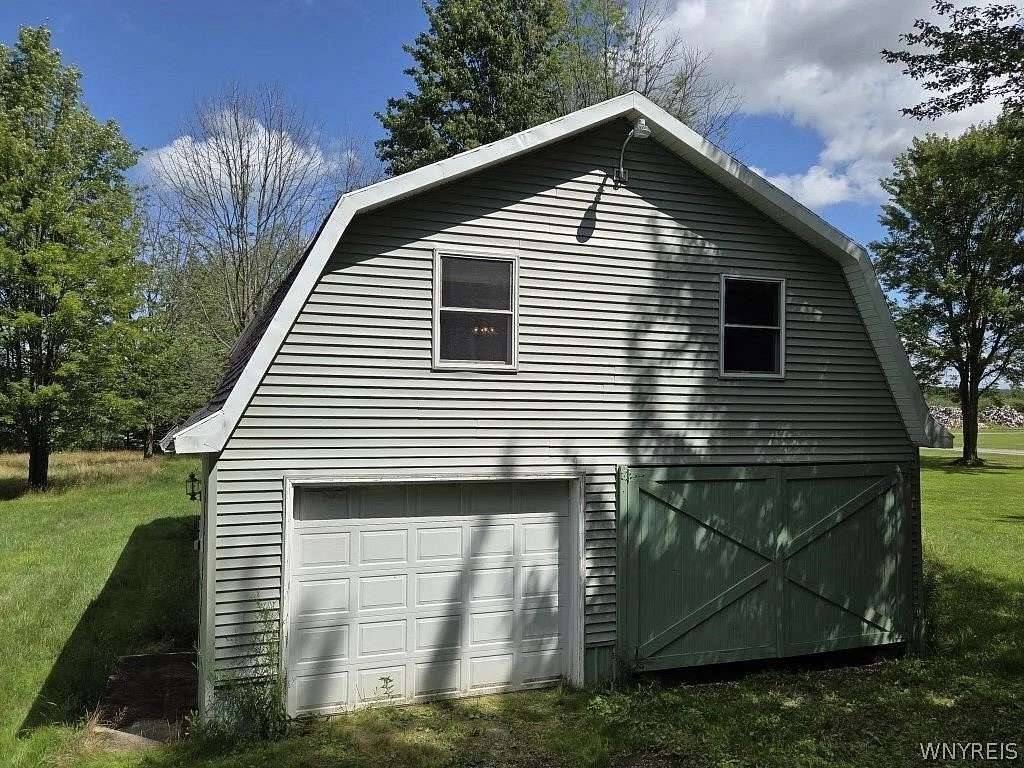 2.1 Acres of Land with Home for Auction in Warsaw, New York