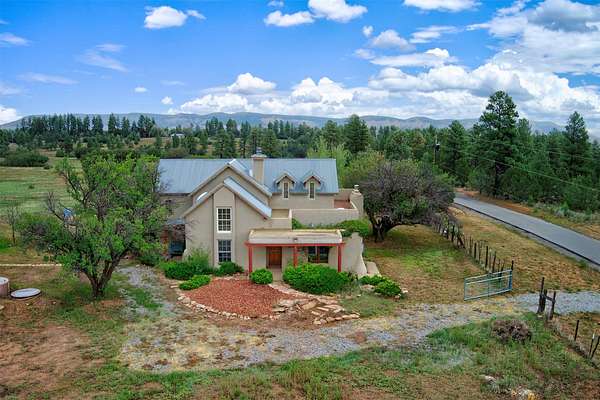 1.73 Acres of Land with Home for Sale in Coyote, New Mexico