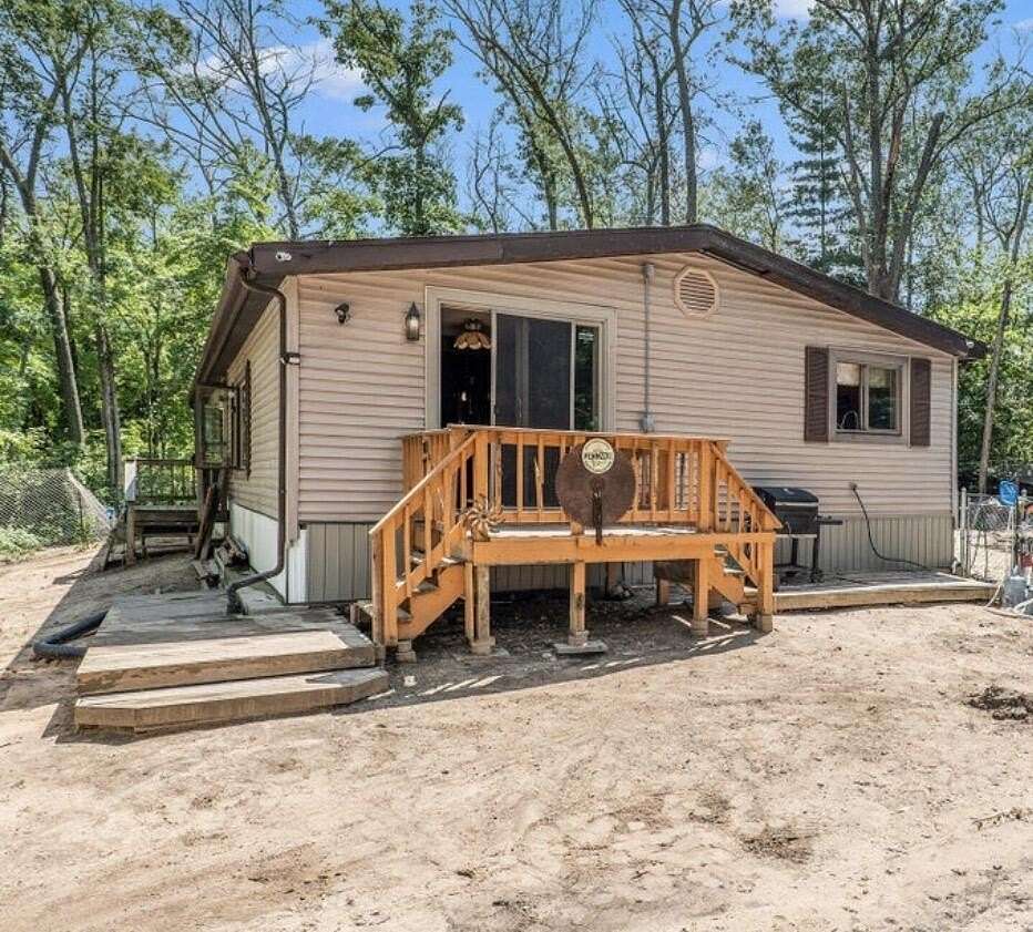2.75 Acres of Land with Home for Sale in White Cloud, Michigan
