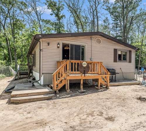 2.75 Acres of Land with Home for Sale in White Cloud, Michigan