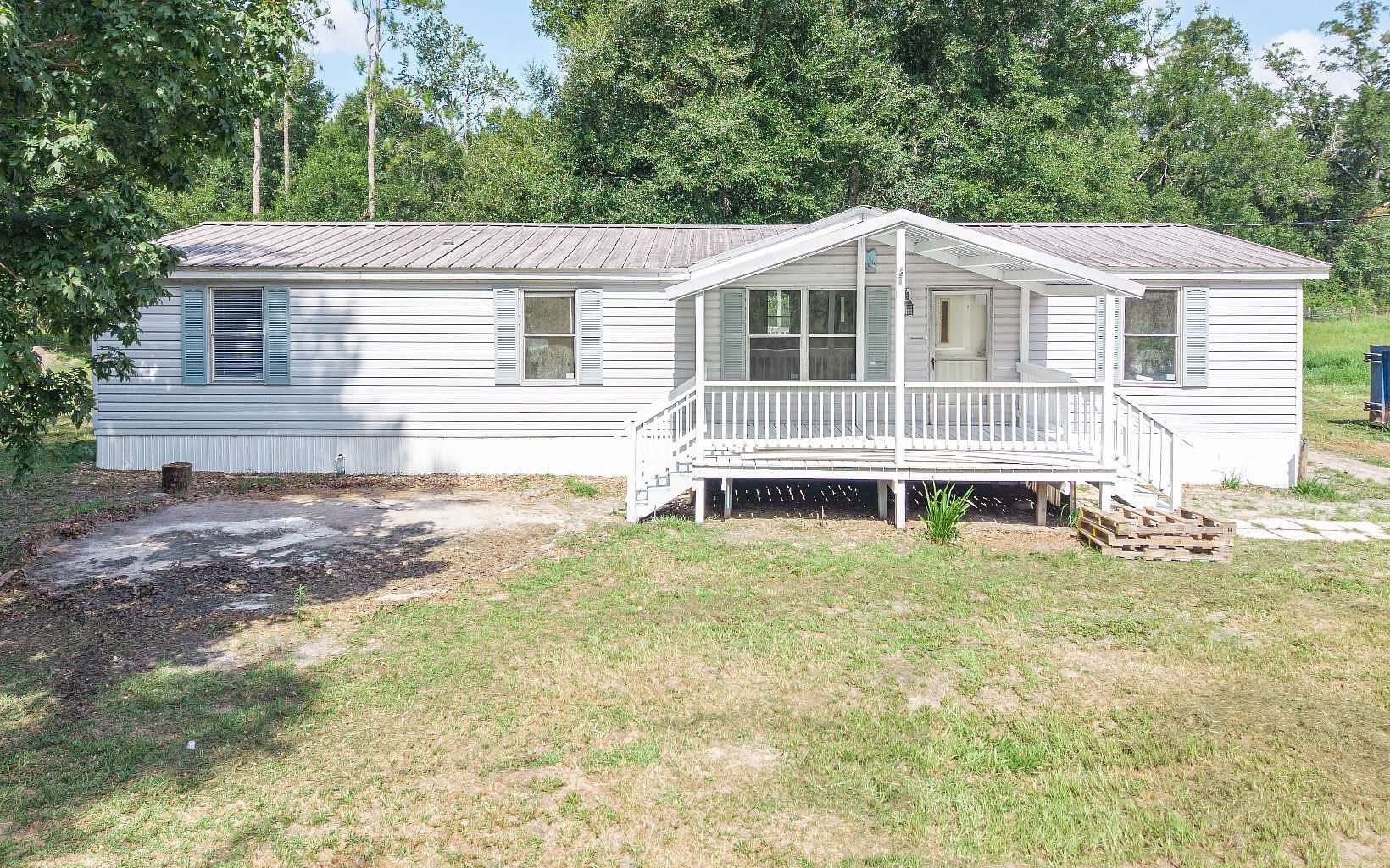5 Acres of Land with Home for Sale in McAlpin, Florida