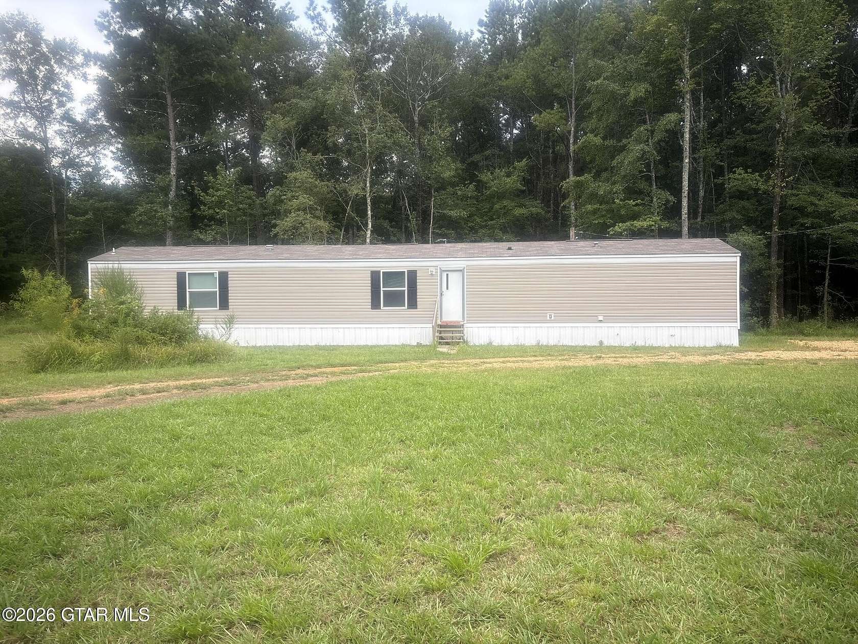1.6 Acres of Land with Home for Sale in Caledonia, Mississippi