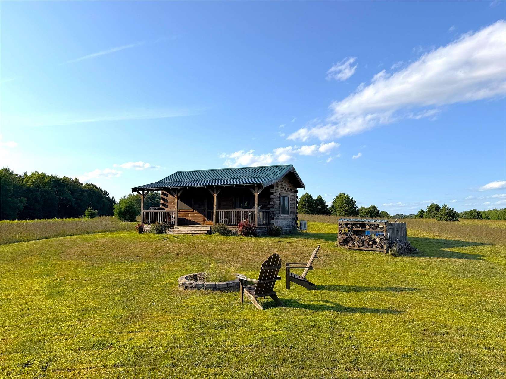 27.4 Acres of Recreational Land with Home for Sale in Holcombe, Wisconsin