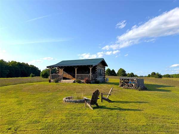 27.4 Acres of Recreational Land with Home for Sale in Holcombe, Wisconsin