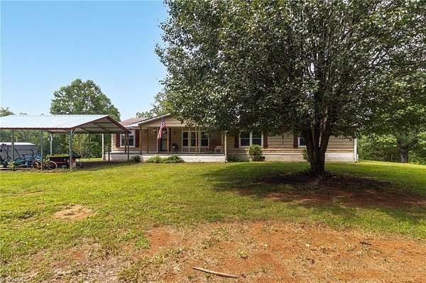 5.4 Acres of Land with Home for Sale in Pilot Mountain, North Carolina