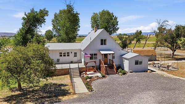 35 Acres of Agricultural Land with Home for Sale in Loma, Colorado