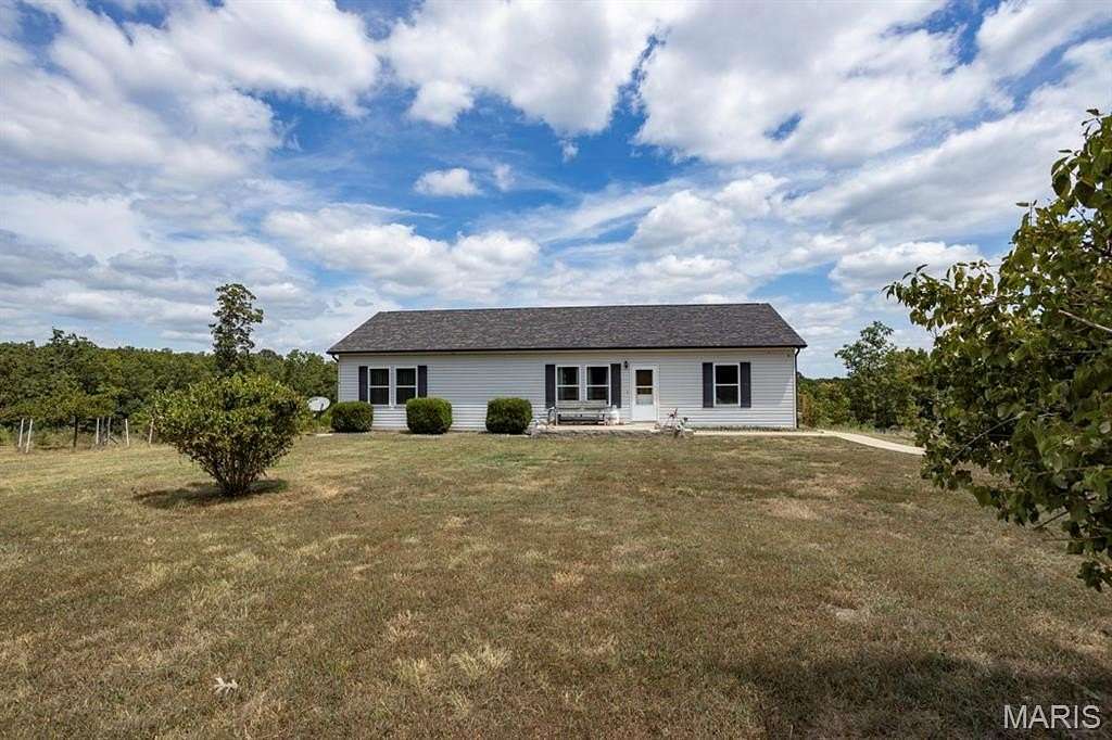 24.6 Acres of Agricultural Land with Home for Sale in Waynesville, Missouri