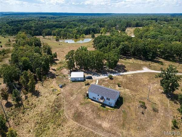 24.6 Acres of Agricultural Land with Home for Sale in Waynesville, Missouri