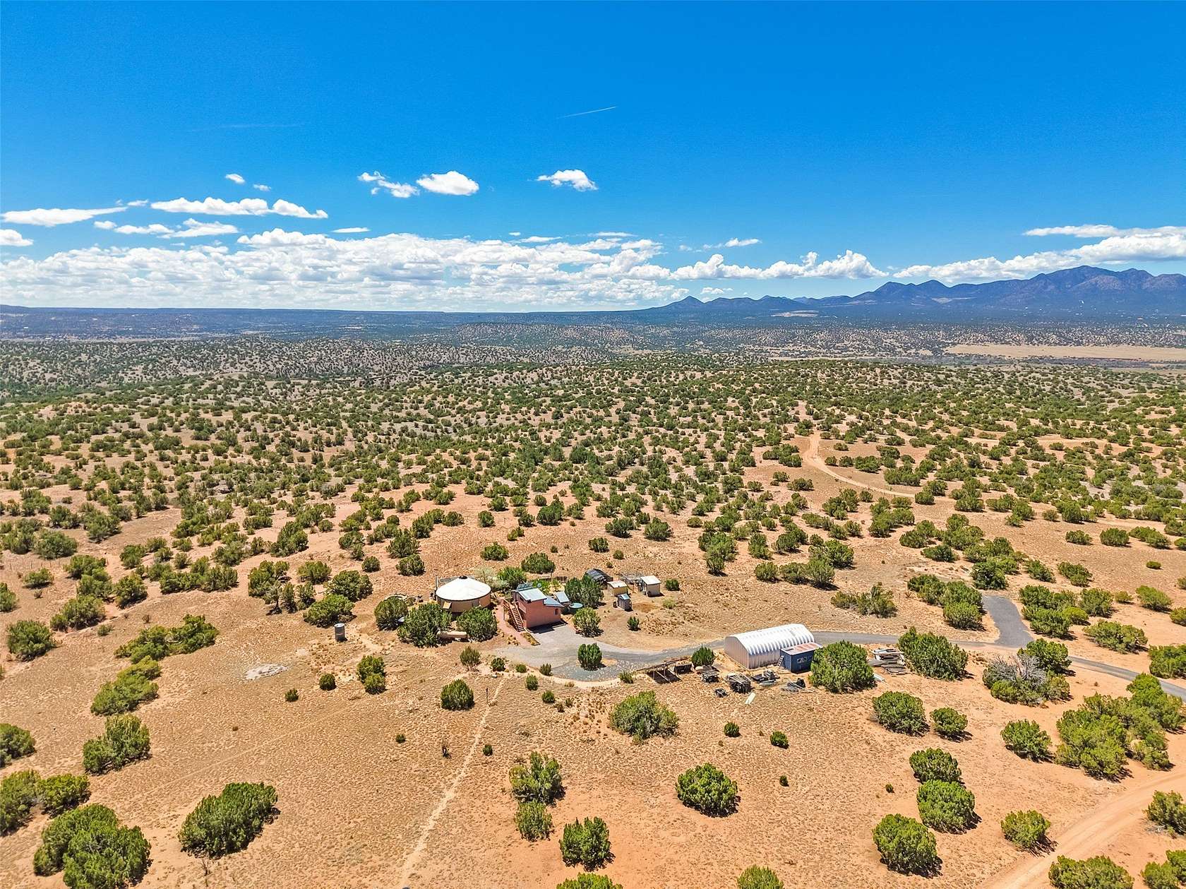 15 Acres of Land with Home for Sale in Cerrillos, New Mexico