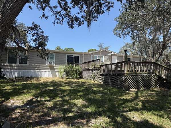 6.9 Acres of Land with Home for Sale in Brooksville, Florida