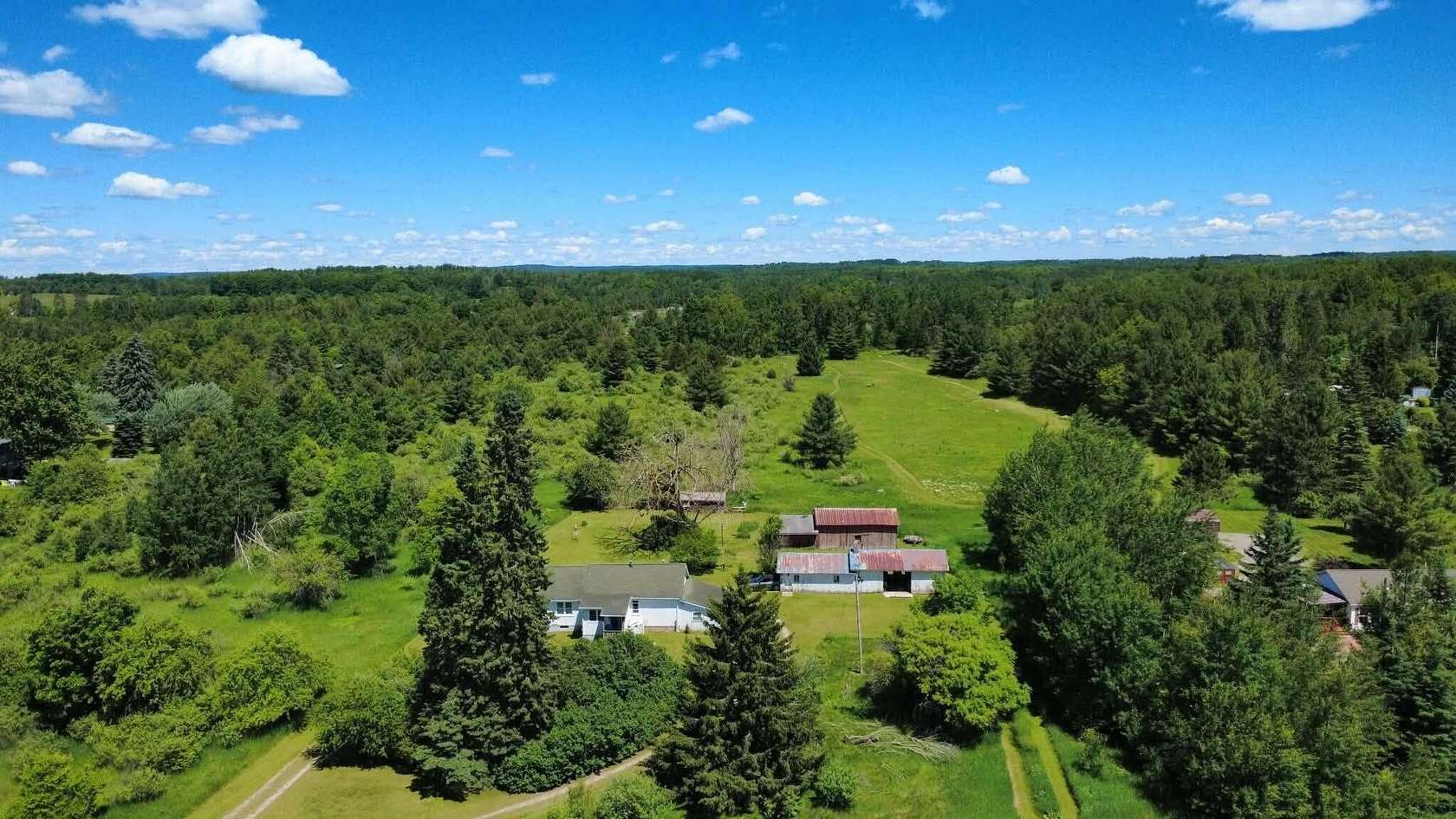 7.2 Acres of Land with Home for Sale in Glennie, Michigan