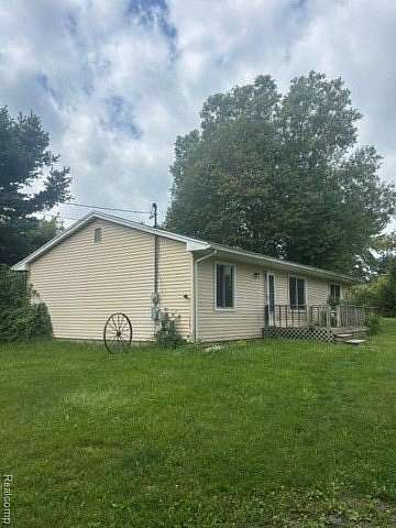 2 Acres of Land with Home for Sale in Tyrone Township, Michigan