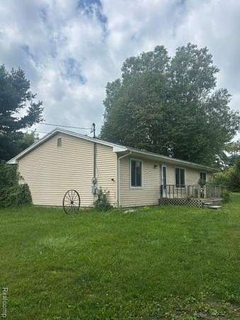 2 Acres of Land with Home for Sale in Tyrone Township, Michigan