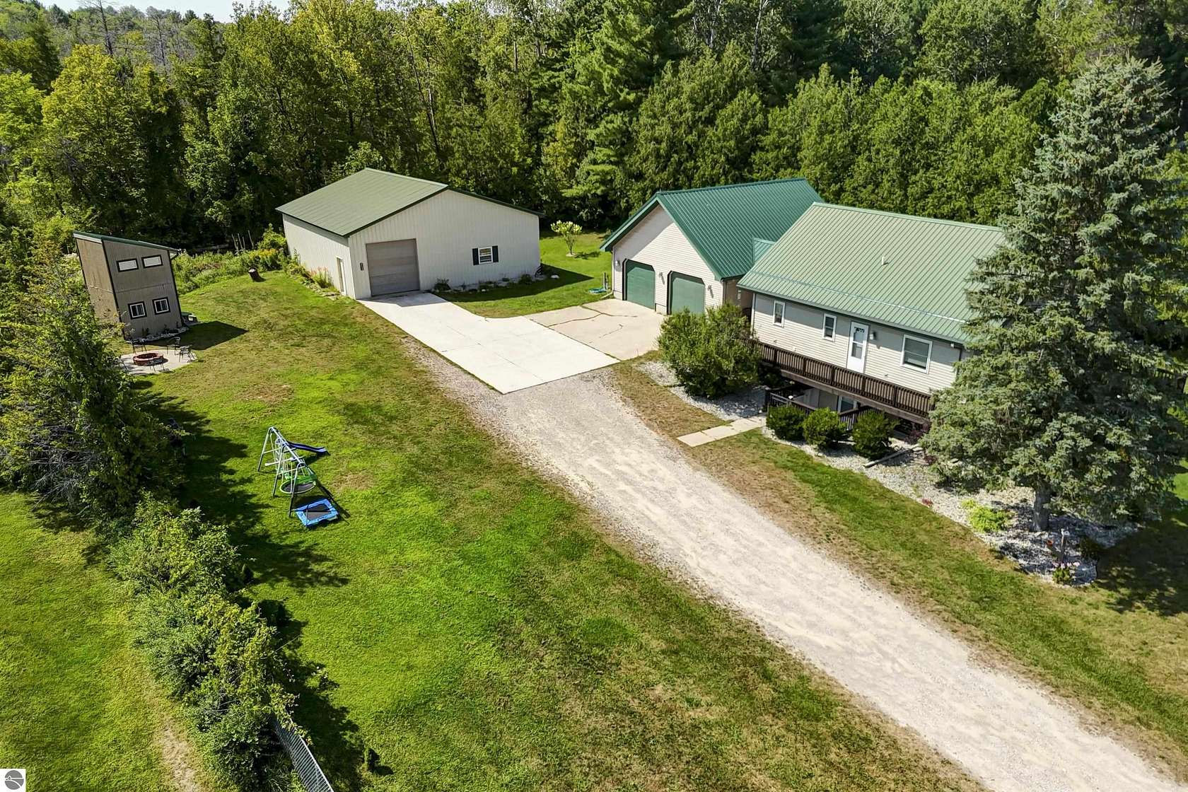 1.5 Acres of Land with Home for Sale in Cedar, Michigan