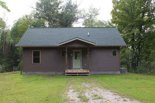 80 Acres of Recreational Land with Home for Sale in Barton City, Michigan