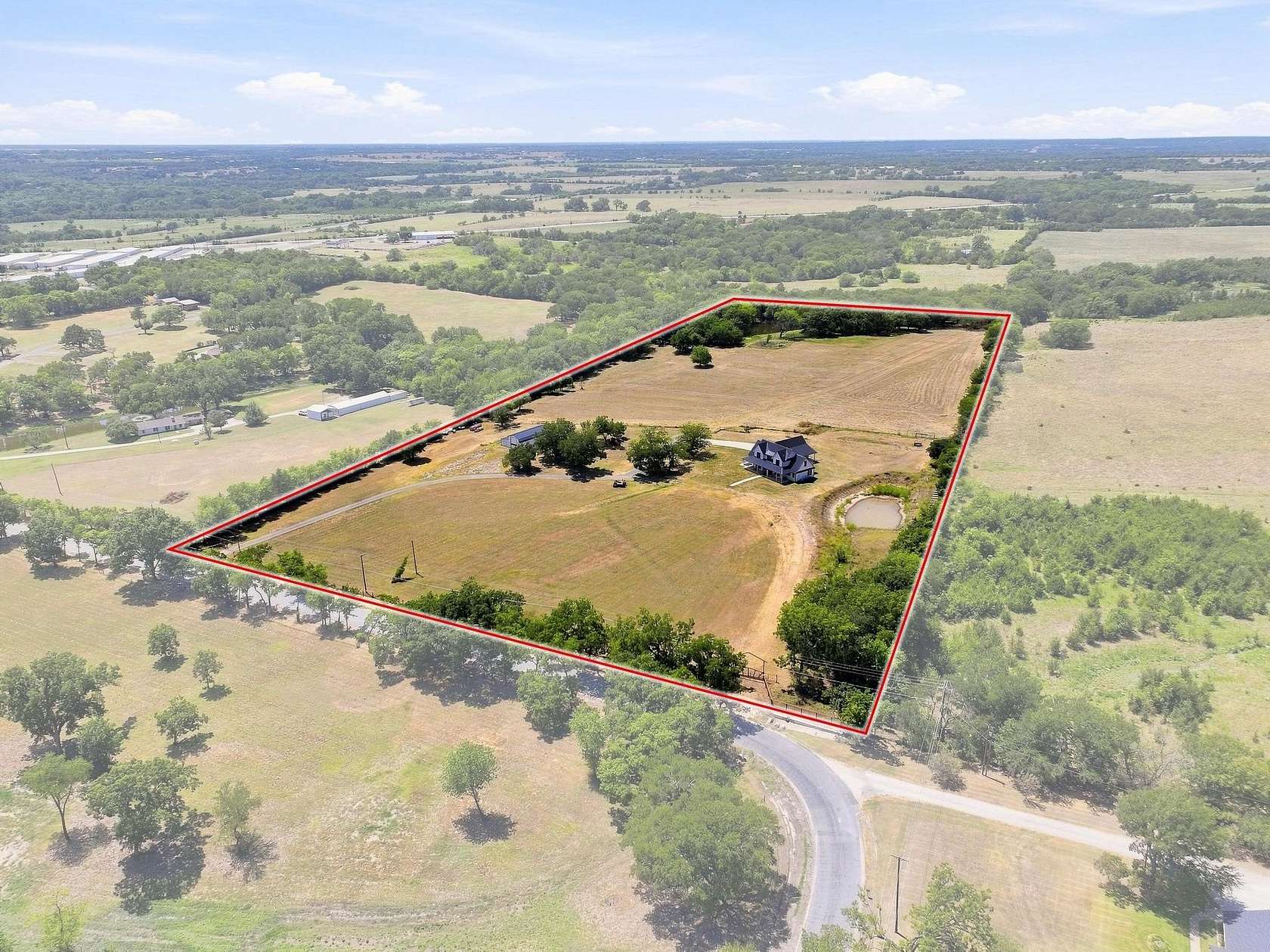 17.4 Acres of Land with Home for Sale in Denison, Texas