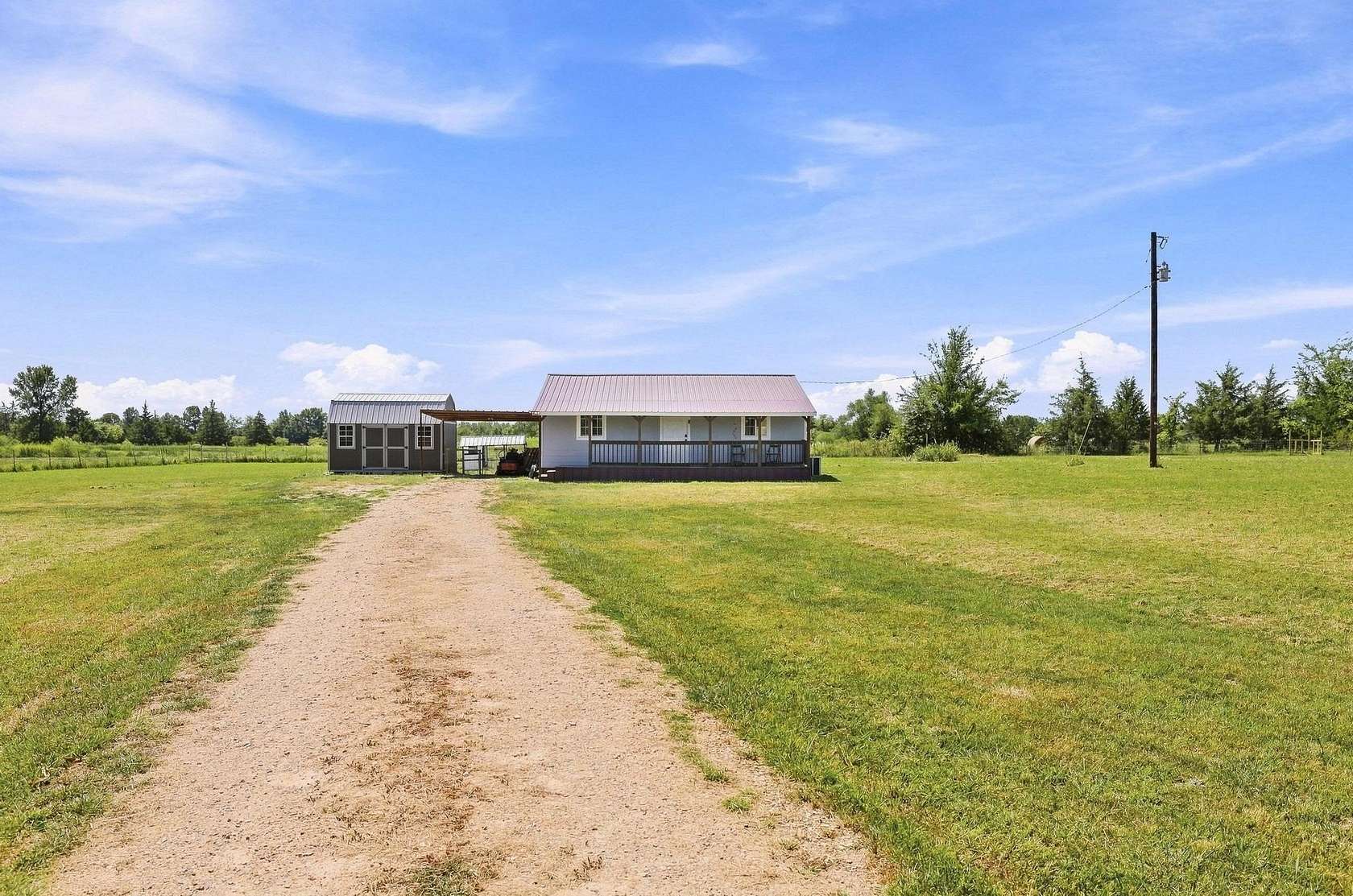 2 Acres of Land with Home for Sale in Deport, Texas