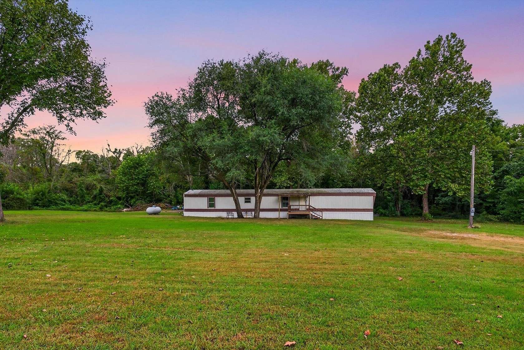 3 Acres of Land with Home for Sale in Collins, Missouri