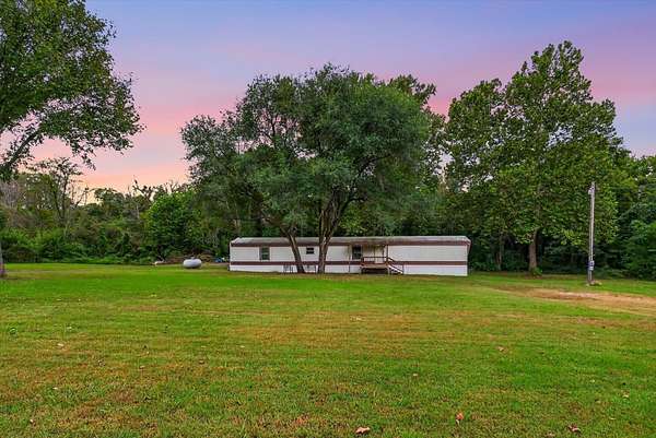 3 Acres of Land with Home for Sale in Collins, Missouri