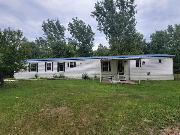2.48 Acres of Land with Home for Sale in Beaverton, Michigan