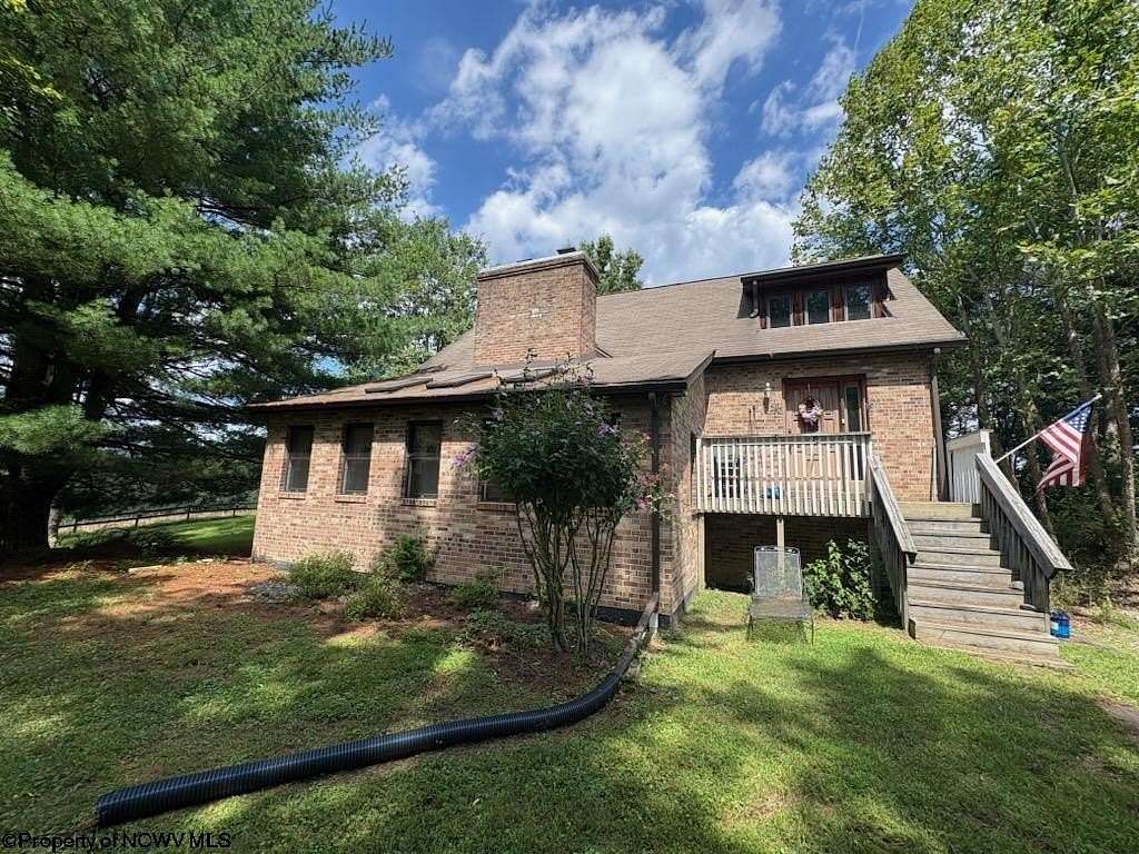 14.2 Acres of Land with Home for Sale in Point Marion, Pennsylvania