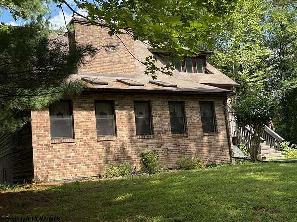 14.2 Acres of Land with Home for Sale in Point Marion, Pennsylvania