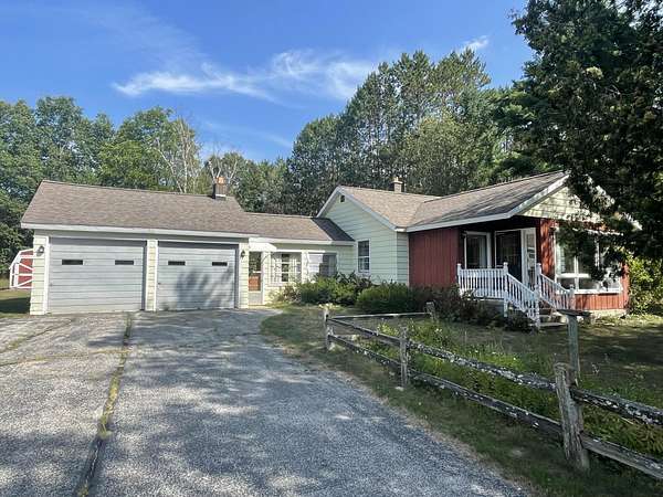 3 Acres of Land with Home for Sale in Irons, Michigan