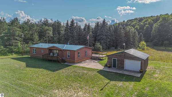 5 Acres of Land with Home for Sale in Mesick, Michigan